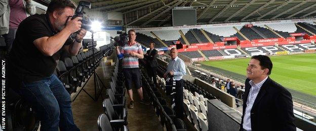 Jason Levien faces the media at the Liberty Stadium