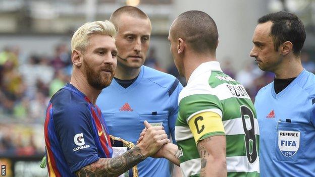 Lionel Messi and Scott Brown