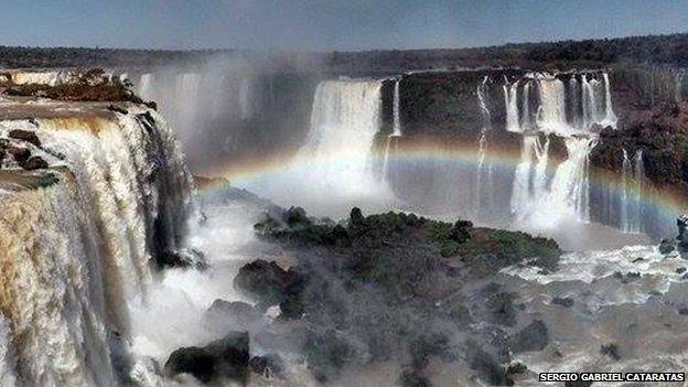 Rainbow over waterfalls