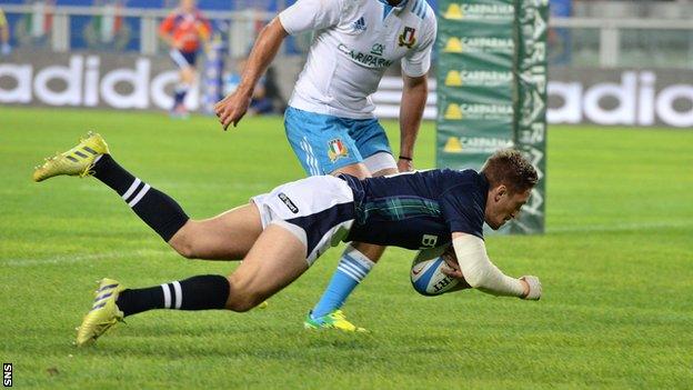 Henry Pyrgos scores a try for Scotland against Italy