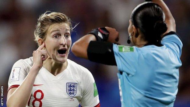 Ellen White with referee at World Cup