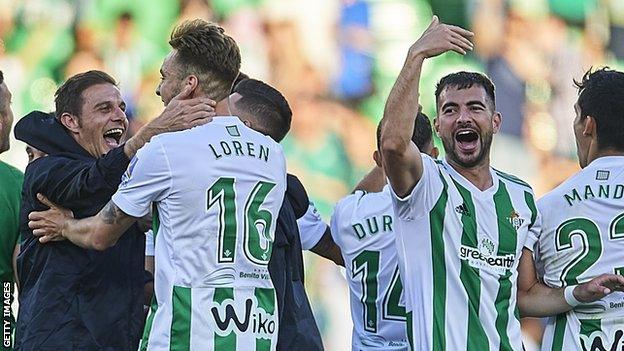 Real Betis celebrate qualifying for the 2018-19 Europa League after beating Sevilla in May