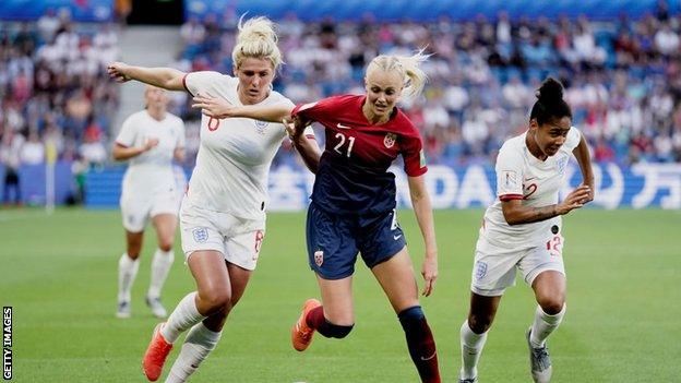 Millie Bright and Demi Stokes close down a Norway defender at the Women's World Cup