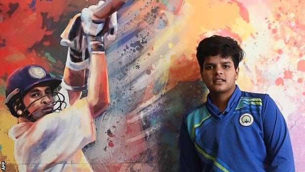 Shafali Verma next to a portrait of India legend Sachin Tendulkar