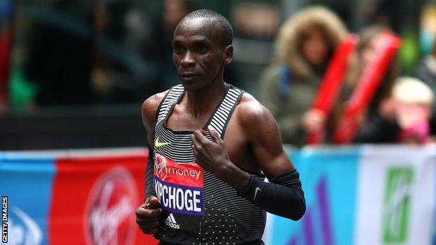 Eliud Kipchoge crosses the finishing line