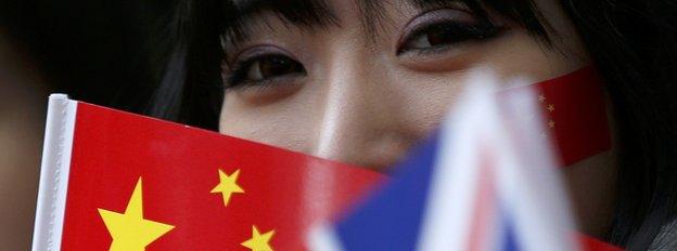 Woman holding Chinese flag