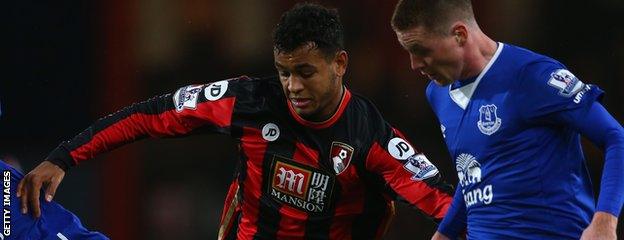 Joshua King battles with Ross Barkley