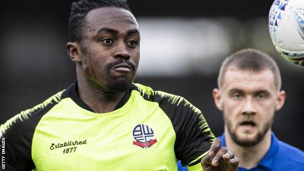 Joe Dodoo in action for Bolton