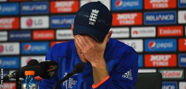 Eoin Morgan covers his face