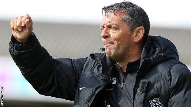 Phil Brown shouts orders at his players from his technical area