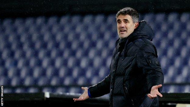 Former Dinamo Zagreb head coach Zoran Mamic holds his hands out as he gestures from the touchline during a Europa League tie