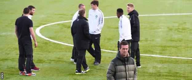 Celtic manager Ronny Deila and players get a feel for the playing surface at New Douglas Park