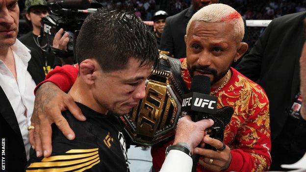 Brandon Moreno and Deiveson Figueiredo in the octagon following Moreno's win over Kai Kara-France