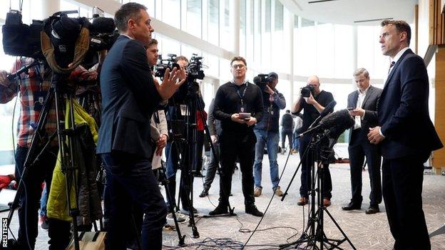 Phil Neville speaks to the media at St George's Park