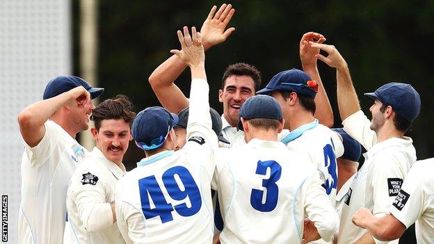 Mitchell Starc celebrates