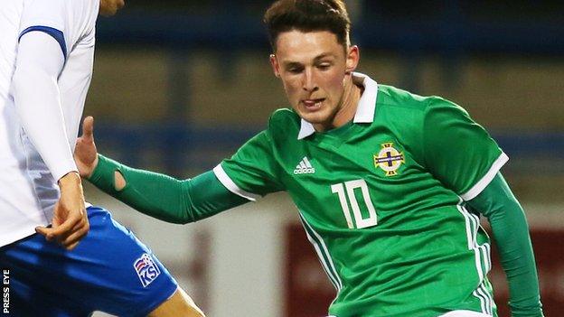 Jordan Thompson in action for Northern Ireland