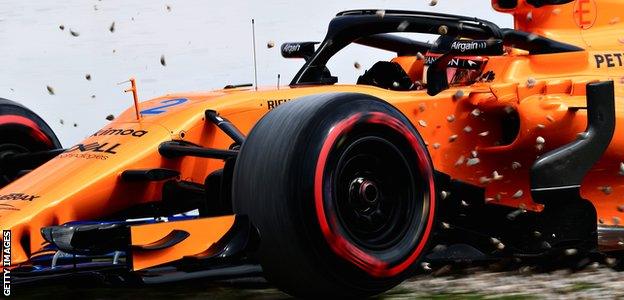 Stoffel Vandoorne of McLaren drives into the gravel during day four of pre-season testing