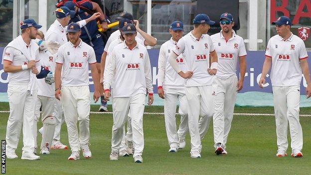 Essex walk onto the field