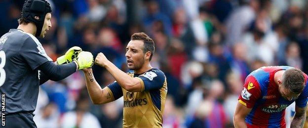 Santi Cazorla celebrates Arsenal's win at Crystal Palace with team-mate Petr Cech