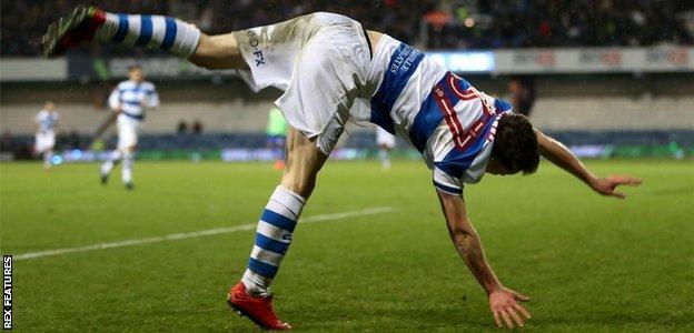 QPR's Paul Smyth celebrate his goal against Cardiff in acrobatic style