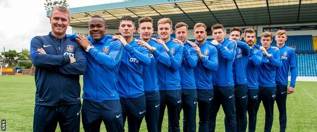 Kilmarnock manager Lee Clark with the 11 new signings unveiled at the end of June