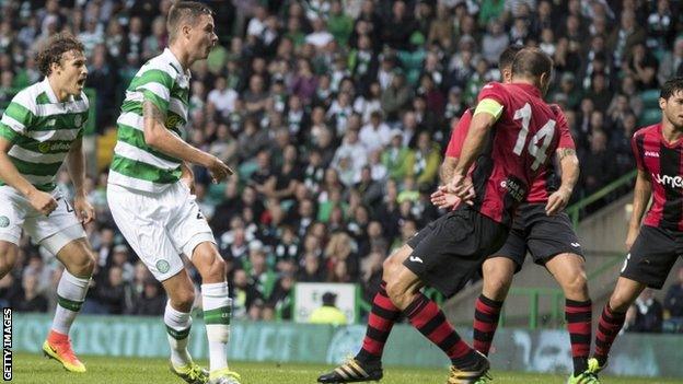 Mikael Lustig swivels to score Celtic's first goal