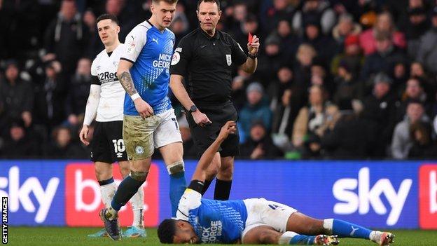 Derby County's Tom Lawrence is sent off against Peterborough