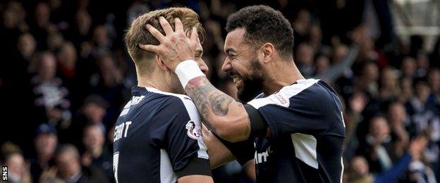 Greg Stewart and Kane Hemmings celebrate with Dundee