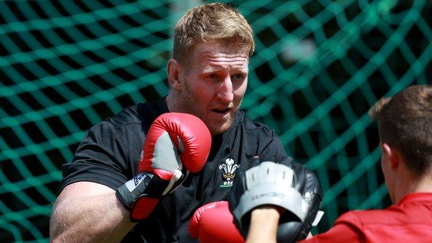 Bradley Davies boxes during Wales training