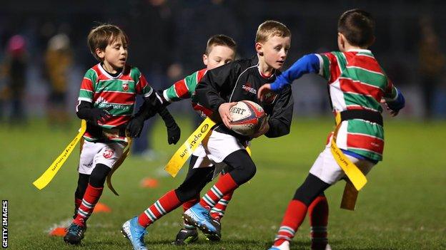 Children playing rugby