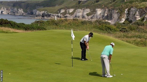 American pair Bubba Watson and JB Holmes on the fifth green at Royal Portrush