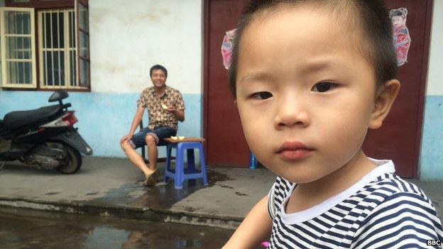 Chinese child with his father