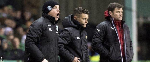 Neil Lennon and Graeme Murty watch their respective Hibernian and Rangers teams do battle