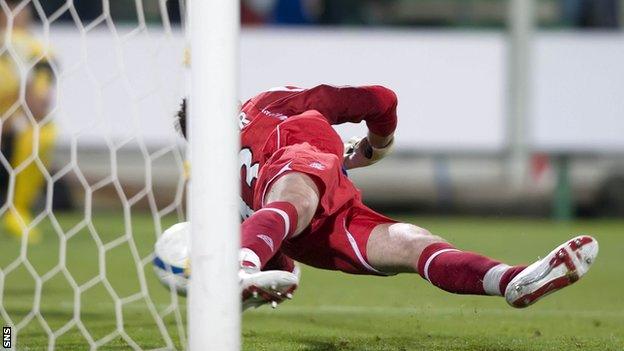 Rangers' goalkeeper saving a penalty