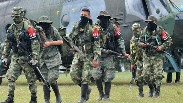 Demobilized members of the ELN (National Liberation Army) arrive in Cali, Colombia on July 16, 2013