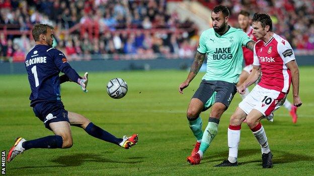 Notts County goalkeeper Sam Slocombe prevented Wrexham's Paul Mullin adding a second goal