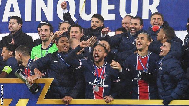 PSG celebrate with trophy