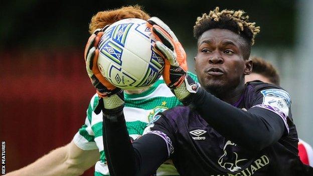 St Pat's Joseph Anang with Rory Gaffney of Shamrock Rovers