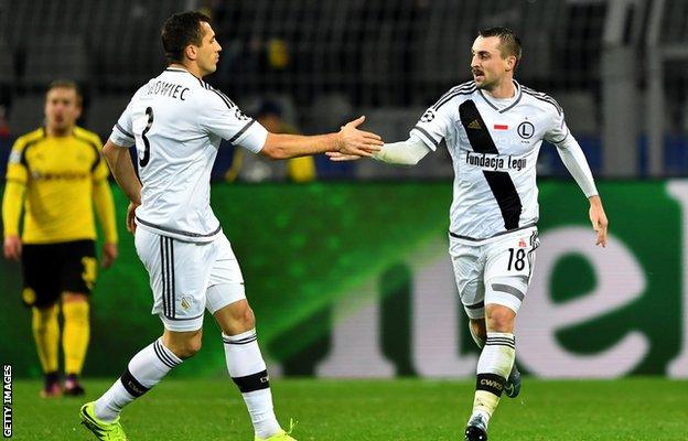 Michal Kucharczyk of Legia Warsaw celebrates scoring his teams third