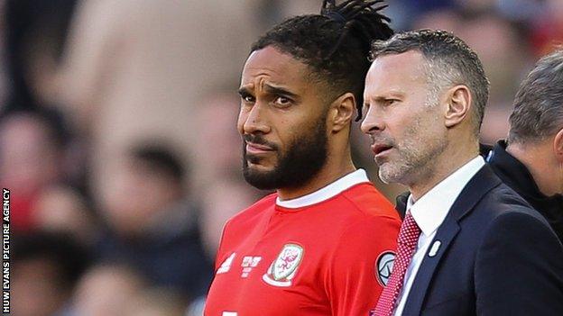 Ashley Williams and Wales manager Ryan Giggs