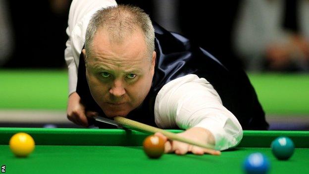 John Higgins plays a shot at the recent UK Championship