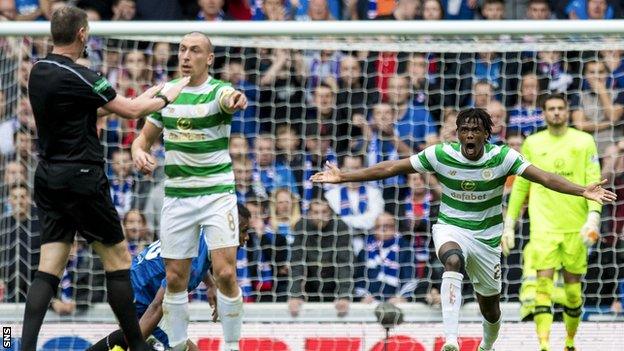 Scott Brown and Dedryck Boyata speak to referee Craig Thomson