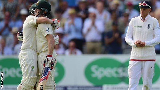 Chris Rogers and Steve Smith embrace