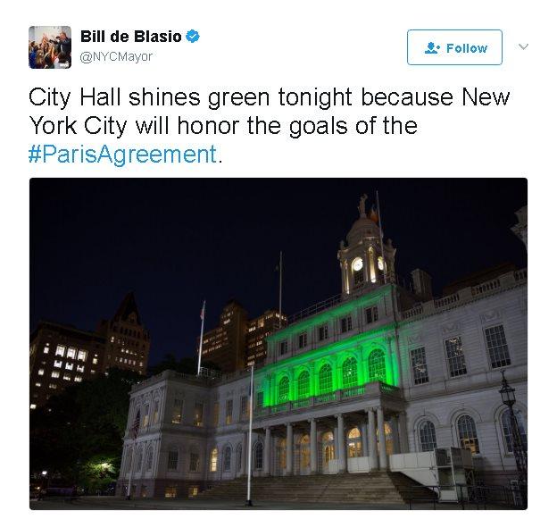 Tweet reads: City Hall shines green tonight because New York City will honor the goals of the #ParisAgreement.