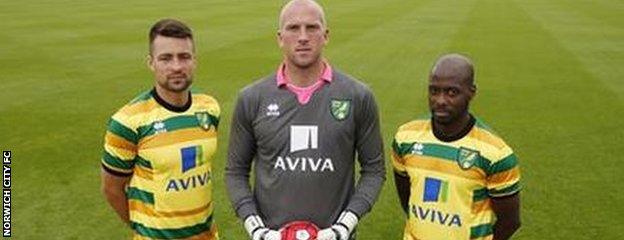 John Ruddy and Youssouf Mulumbu model Norwich City's new third kit