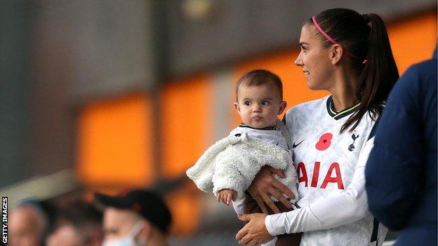 Alex Morgan with child