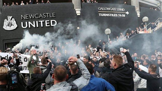 Newcastle fans celebrate takeover