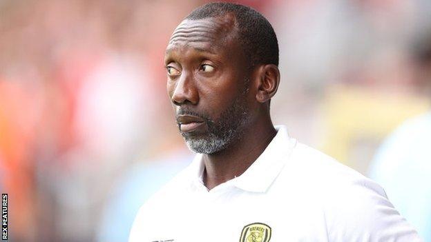 Manager Jimmy Floyd Hasselbaink on the sideline for Burton