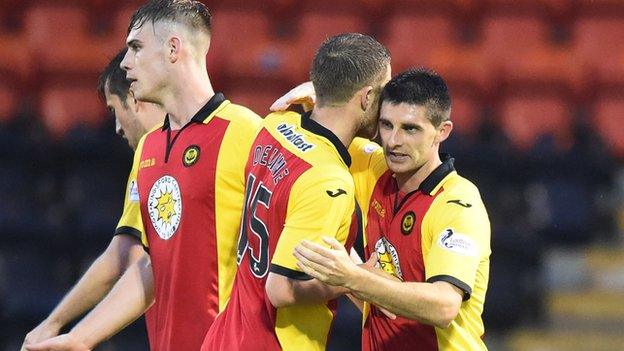 Partick Thistle's Kris Doolan (right) celebrates scoring the opening goal