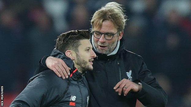 Adam Lallana with Jurgen Klopp